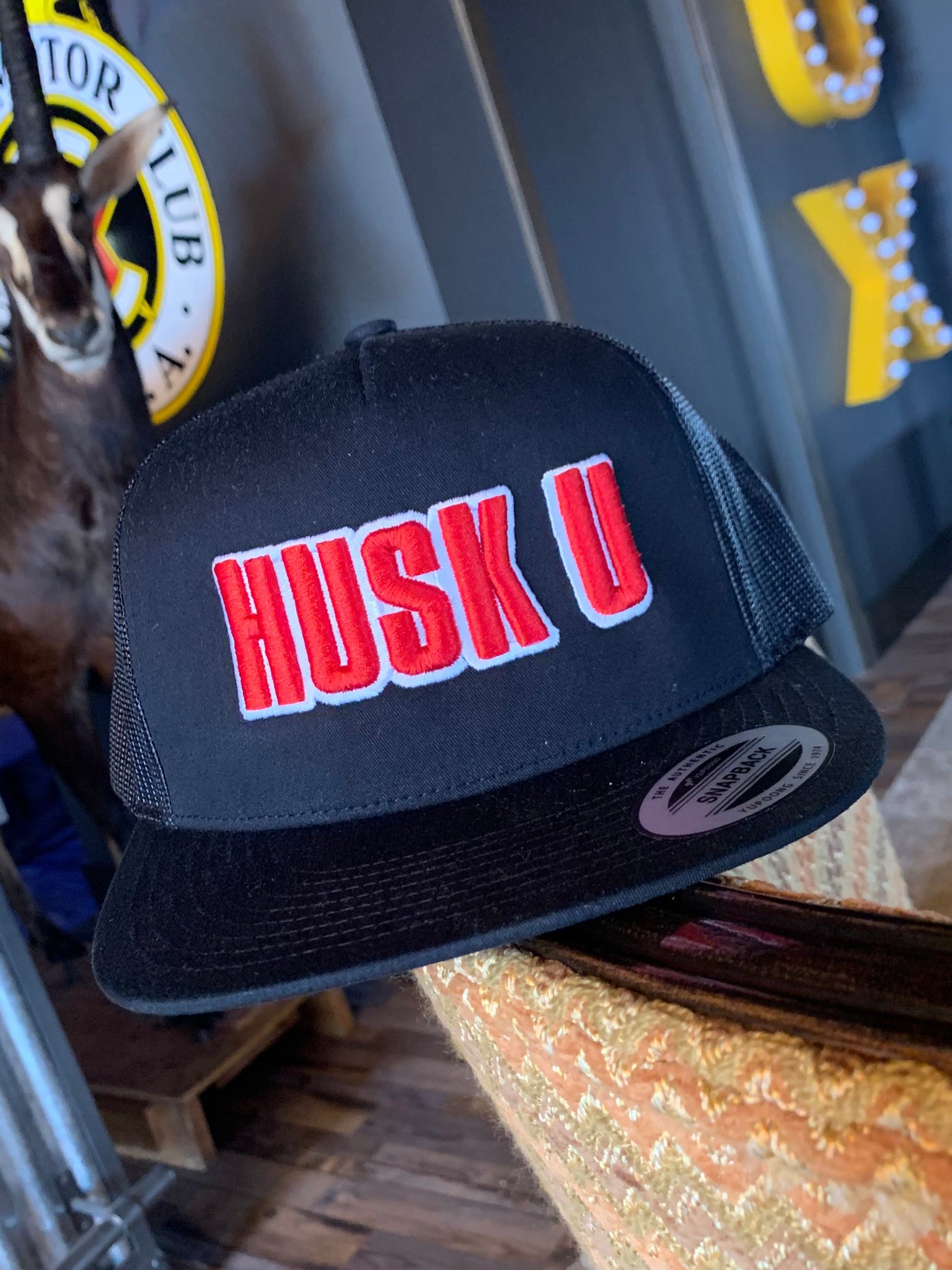 HUSK U Flat Bill Trucker Hat with PUFF Embroidery